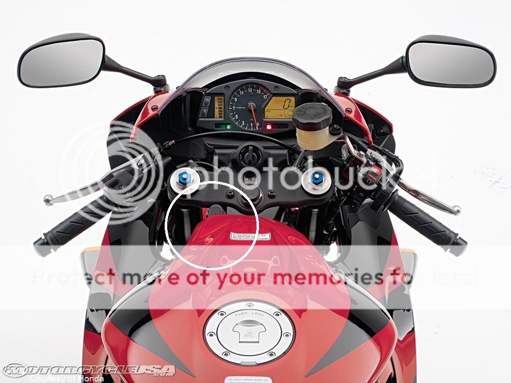 What is with the cbr600rr tank cover?? Honda CBR 600RR Forum